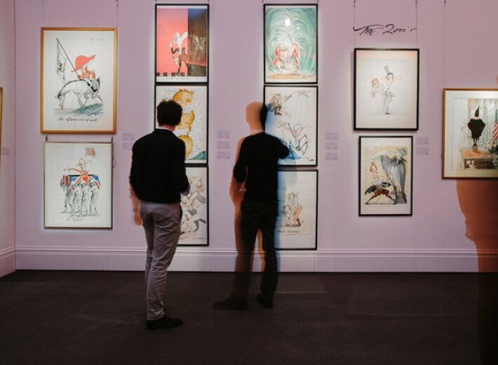 several contemporary prints on the wall that are part of an exhibition selling fine art prints