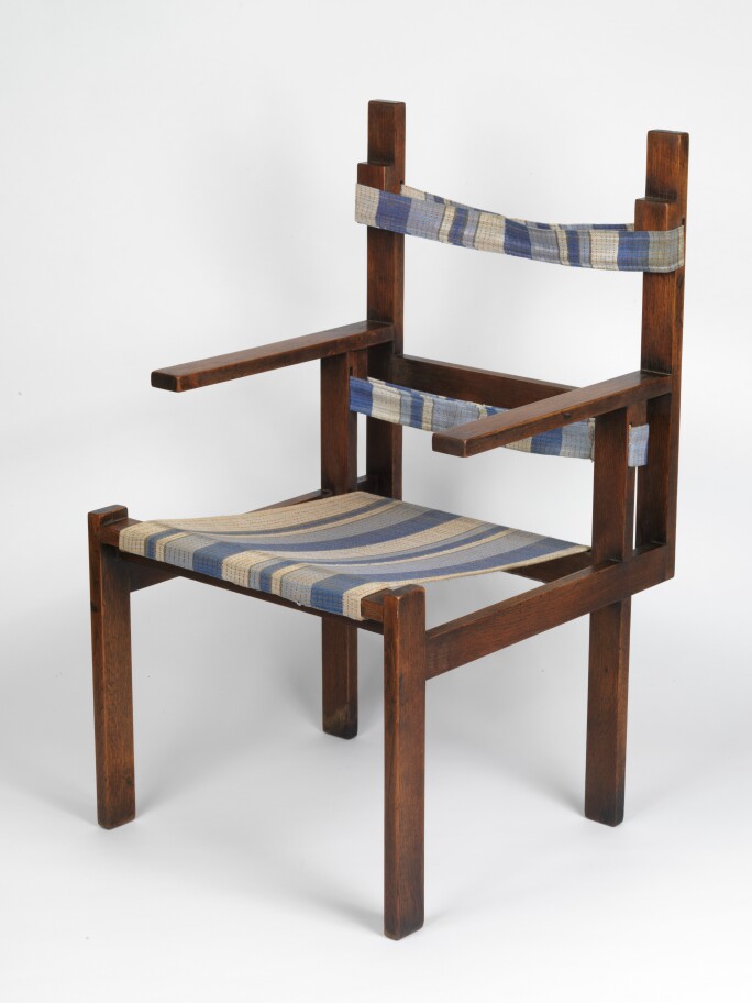 a marcel breuer armchair with stripe cloth seat and backing