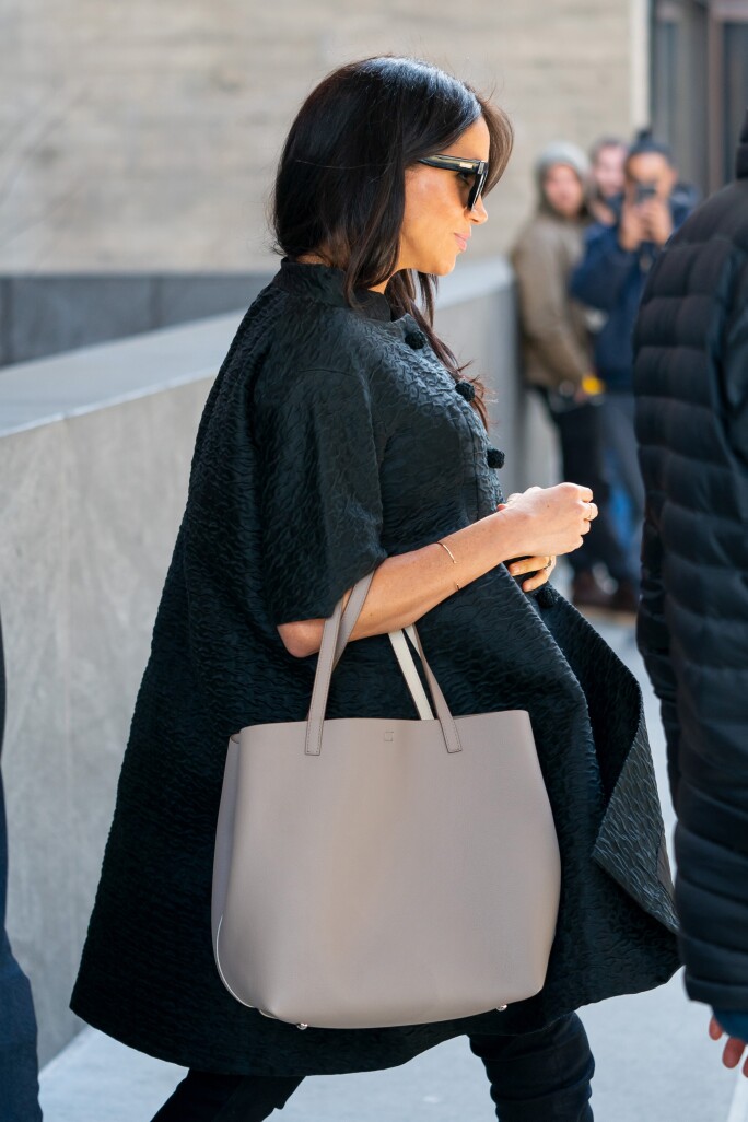 Meghan, Duchess of Sussex wears a 1960s Courrèges coat to her baby shower. Photo: Gotham/GC Images