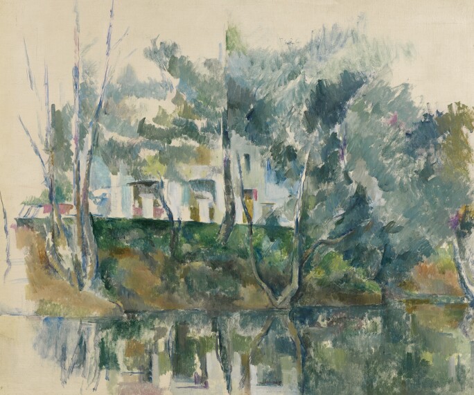 A Cézanne landscape of houses and trees reflected in nearby water.