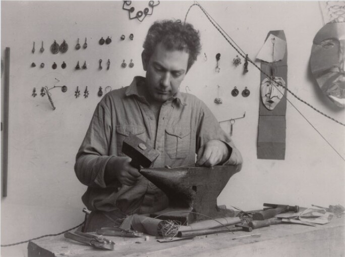 Alexander Calder hammering jewelry