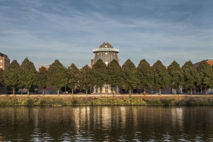 A view of the Bonnefantenmuseum from across the scenic Maas River