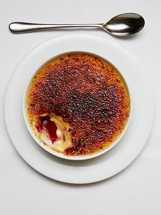 A dish available at SOTHEBY’S Restaurant, RASPBERRY CRÈME BRULÉE