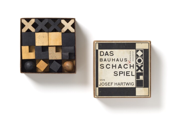chess pieces from Josef Hartwig's chess set in their box