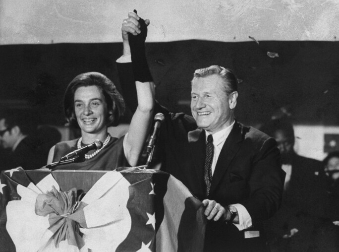 Nelson & Happy Rockefeller rejoice at a podium