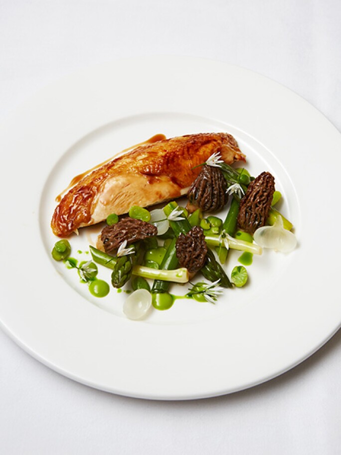 ROASTED LABEL ANGLAIS CHICKEN ,MORELS, WILD GARLIC EMULSION, SUMMER LEEKS, ENGLISH ASPARAGUS, ROASTED CHICKEN JUICES, a dish available at Sotheby's Restaurant