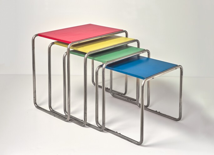Marcel-Breuer,-four-side-tables,-circa-1926,-nickel-plated-metal,-wood-in-four-colors,-(the-largest-table)Collection-Büscher,-Cologne.jpg