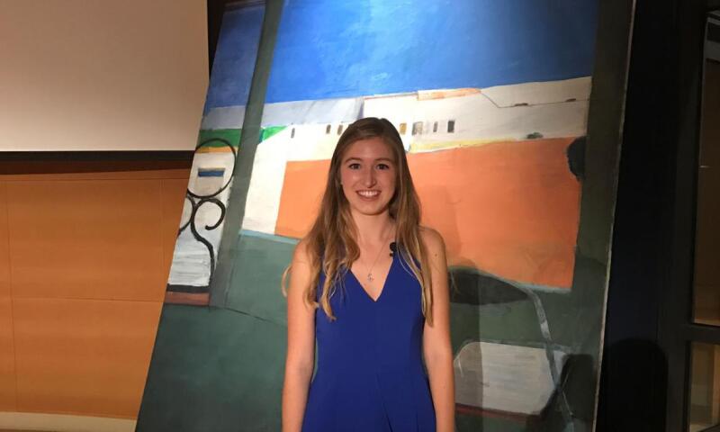 Katherine Van Kirk, ’19, with the Diebenkorn painting Window, which she examined in her investigative project